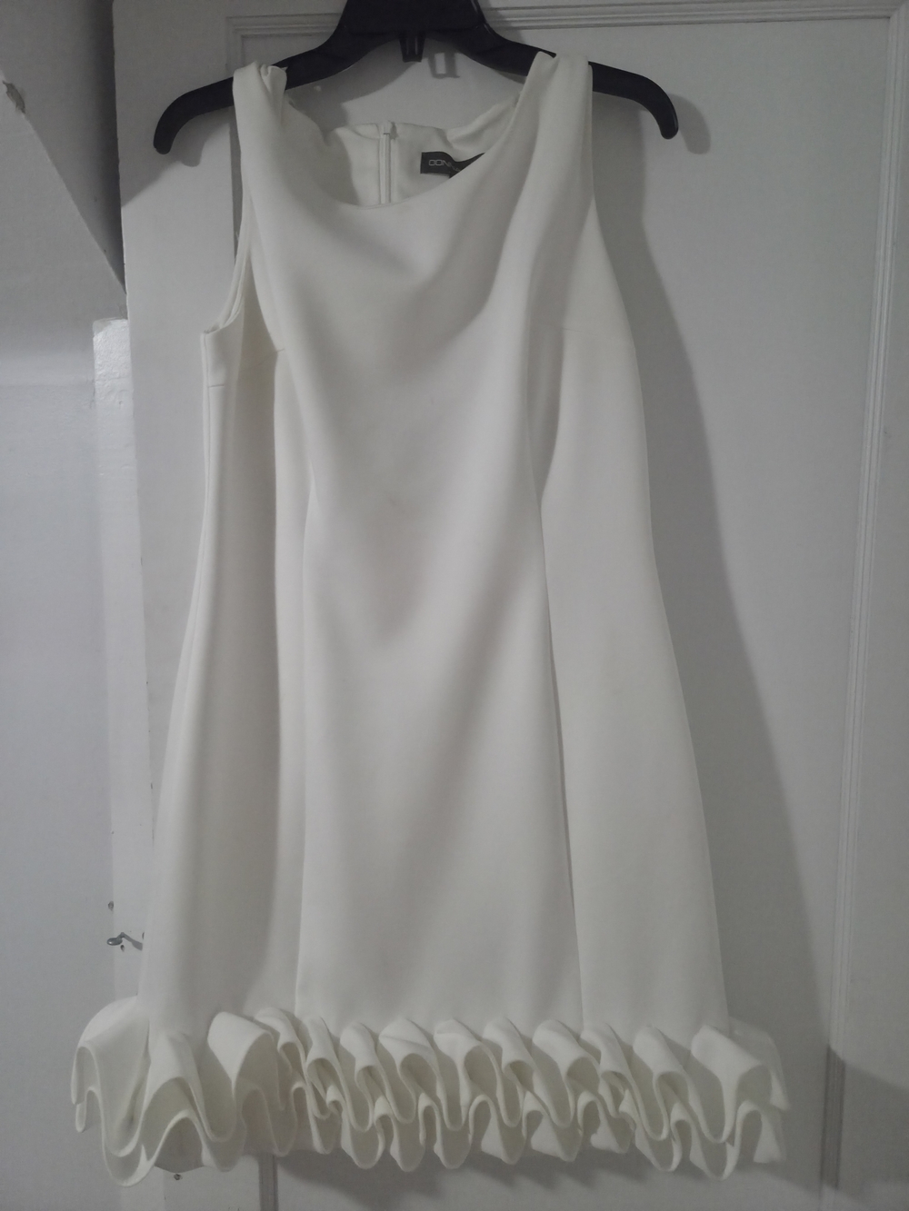 Donna Ricco White Sleeveless Mini Dress with Ruffle Hem Detail